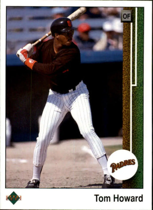 Baseball player in San Diego Padres pinstriped uniform at bat featuring Thomas Howard