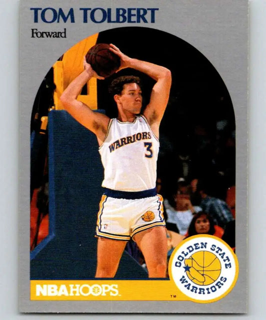 Vintage Golden State Warriors basketball card of Tom Tolbert in white home uniform