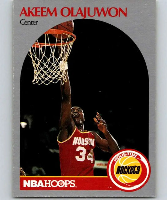 Hakeem Olajuwon dunking in red jersey on 1990-91 Hoops Houston Rockets Basketball Card