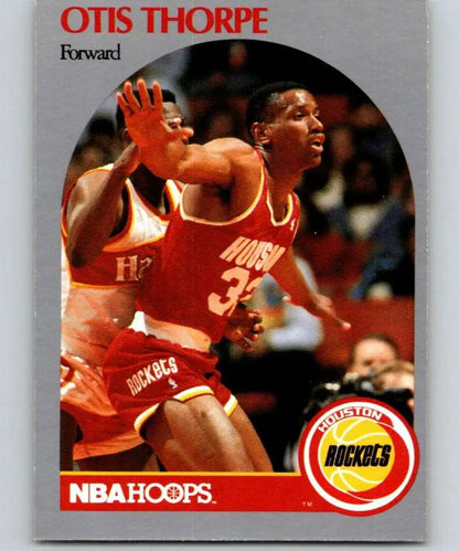 Vintage NBA Hoops basketball card of Otis Thorpe in Houston Rockets red uniform