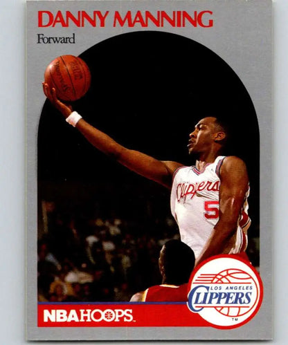 Basketball trading card of Danny Manning from the Los Angeles Clippers reaching for the ball