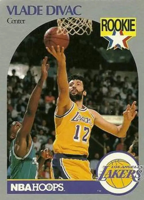 Vlade Divac Lakers trading card, jersey number 12, shot moment captured in action