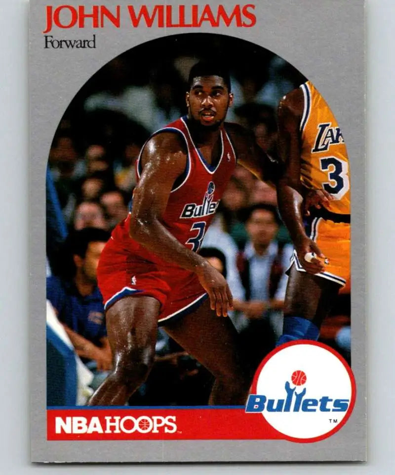 Basketball card of John Williams in a Washington Bullets red jersey during a game