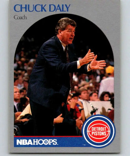 Basketball coach Chuck Daly in a dark suit on the sidelines, Detroit Pistons Basketball Card