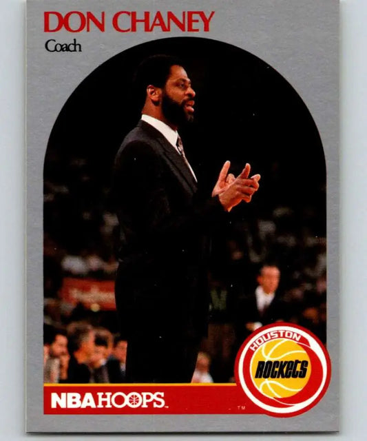 Basketball coach Don Chaney in dark suit gestures on sidelines for Houston Rockets basketball card