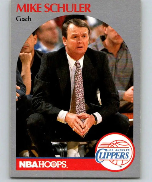 Basketball card of Mike Schuler coaching the Los Angeles Clippers courtside