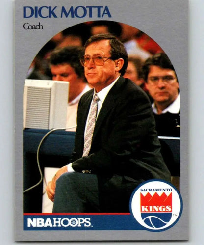 NBA Hoops basketball card of Dick Motta, Sacramento Kings coach in dark suit courtside