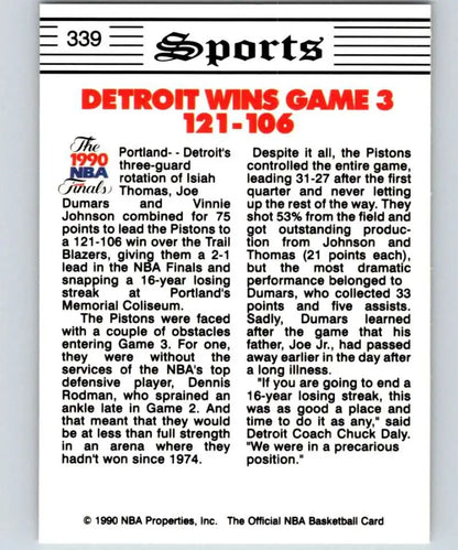 Newspaper sports article detailing Detroit Pistons victory over Portland Trail Blazers 121-106