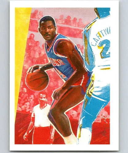 Joe Dumars dribbling in blue vs defender on Detroit Pistons basketball card