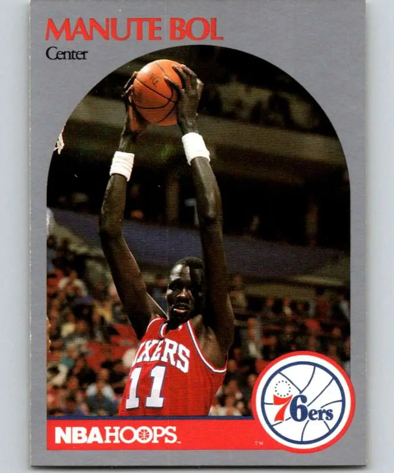 1990 NBA Hoops card of Manute Bol, Philadelphia 76ers Basketball jersey number 11