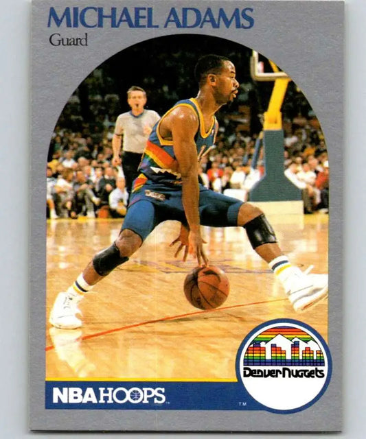 Michael Adams dribbling on court in Denver Nuggets uniform from basketball card