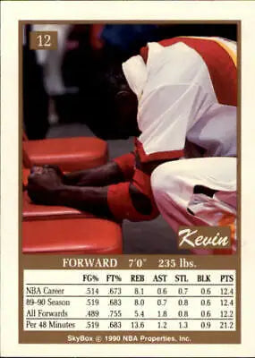 Kevin Willis Atlanta Hawks basketball card featuring player resting on red seats