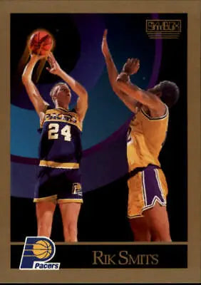 Basketball trading card of Rik Smits shooting for the Indiana Pacers #24 over a defender