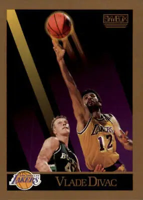 Vlade Divac rookie card showcasing Los Angeles Lakers player reaching for the ball