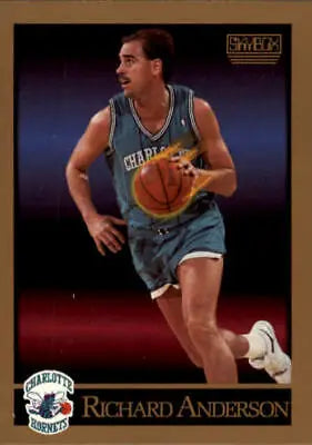 Richard Anderson dribbling in teal uniform on 1990-91 SkyBox Charlotte Hornets card