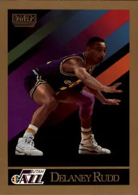 Basketball player in Utah Jazz uniform demonstrating defensive stance on Delaney Rudd card