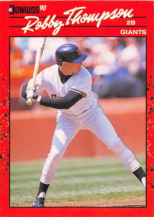 Red 1990 Donruss baseball card of San Francisco Giants player Robby Thompson at bat