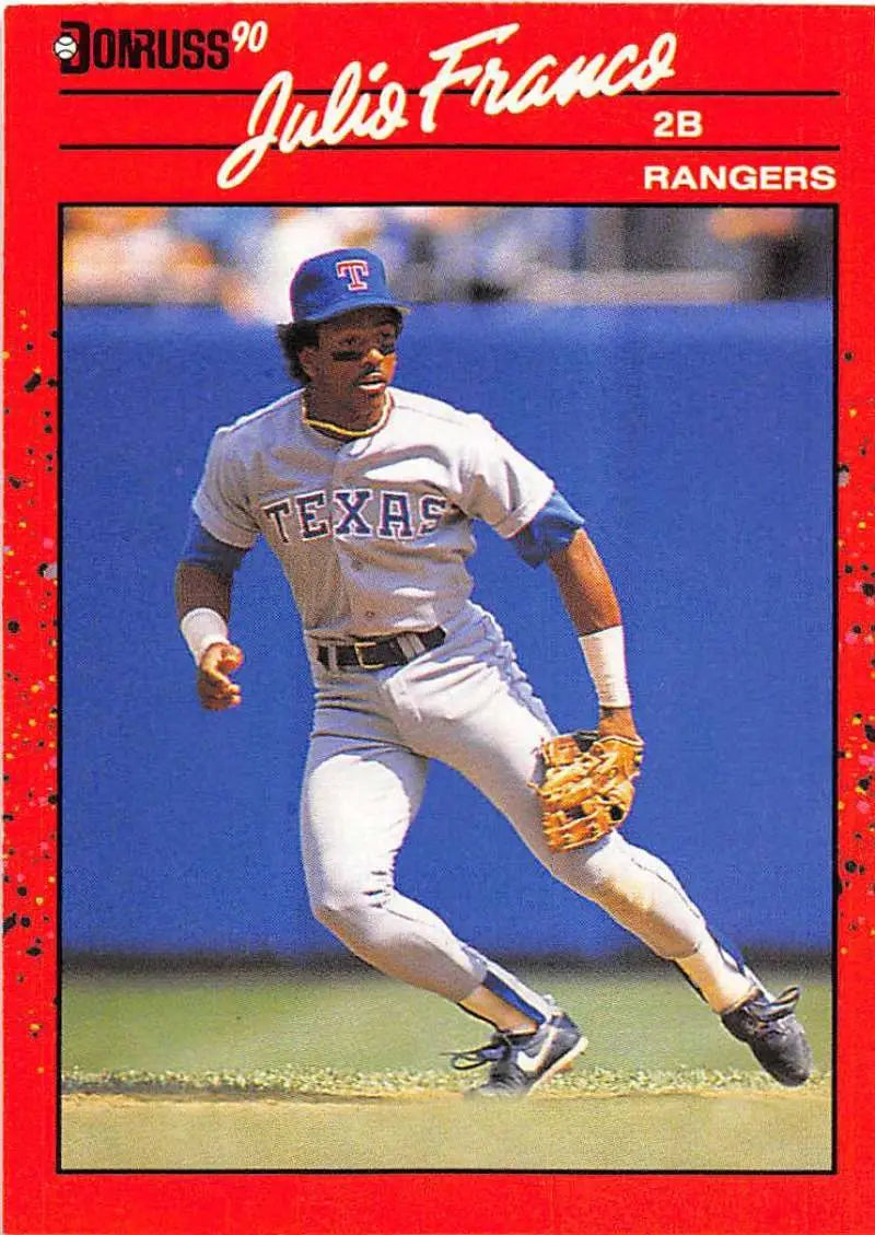 1990 Donruss #142 Julio Franco Texas Rangers baseball card in action for trading cards collection