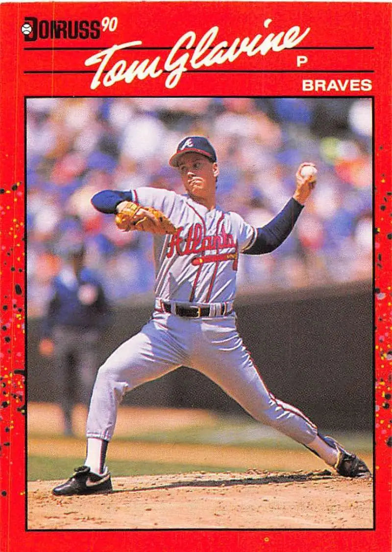 Baseball card showcasing Braves pitcher Tom Glavine in gray road uniform