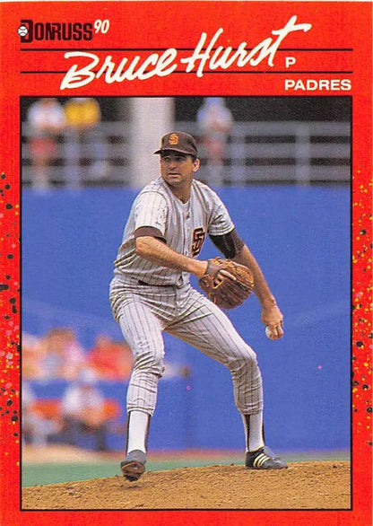 1990 Donruss Bruce Hurst baseball card featuring San Diego Padres pitcher mid-delivery