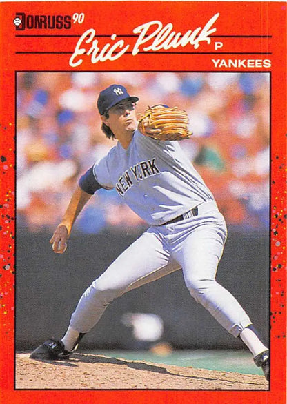 1990 Donruss Eric Plunk Baseball Card featuring Yankees pitcher in delivery pose