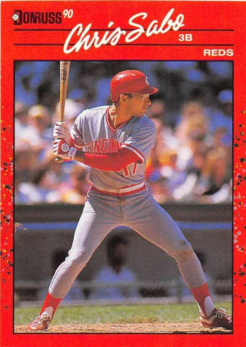 Red-bordered 1990 Donruss Chris Sabo baseball card featuring Cincinnati Reds player at bat