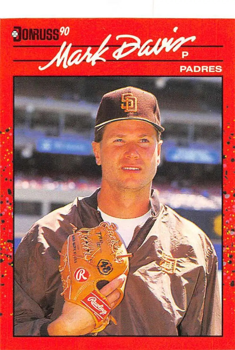 1990 Donruss #302 Mark Davis San Diego Padres Baseball Card in red with glove