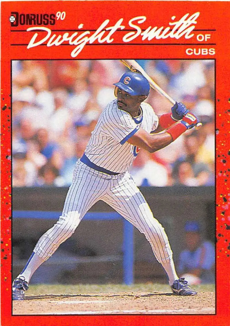 1990 Donruss #393 Dwight Smith Chicago Cubs baseball card in batting stance with pinstripes