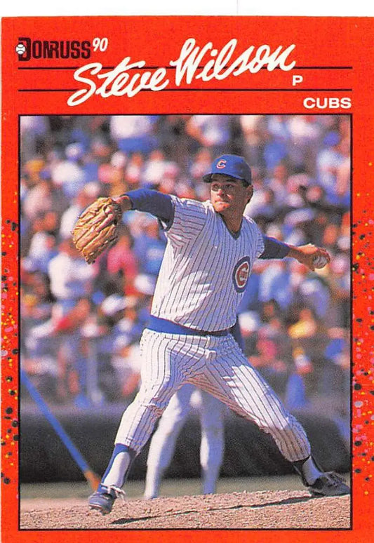 1990 Donruss #394 Steve Wilson baseball card of Cubs pitcher in pinstriped uniform