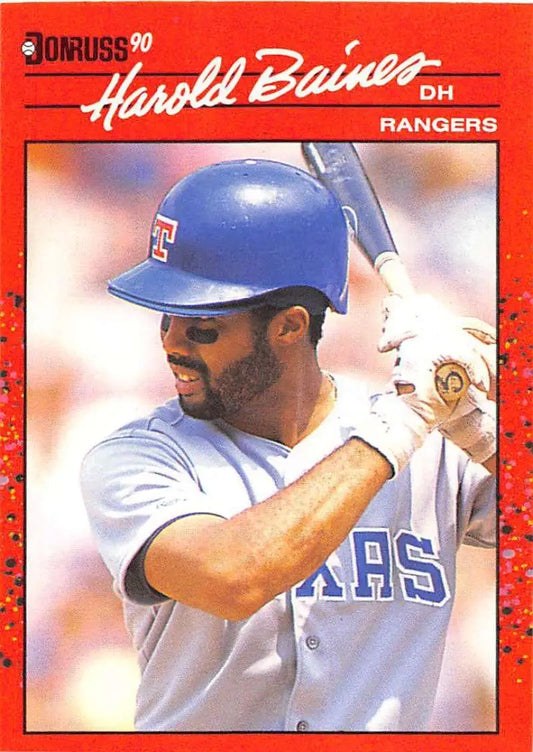 Red-bordered 1990 Donruss baseball card of Harold Baines with Texas Rangers at bat