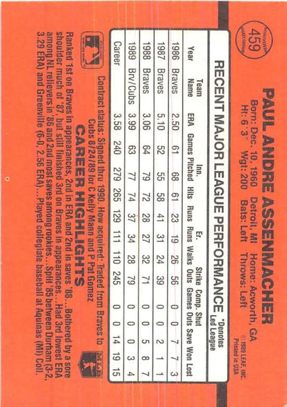 Orange baseball card featuring player stats from 1990 Donruss Paul Assenmacher