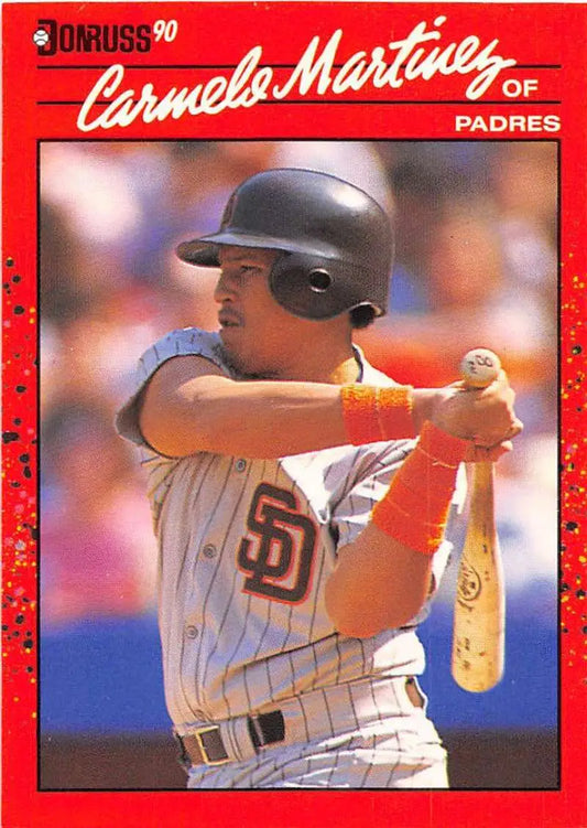 1990 Donruss Carmelo Martinez baseball card showcasing Padres player at bat