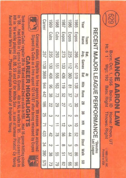 Orange 1990 Donruss #629 Vance Law baseball card showcasing player stats and performance