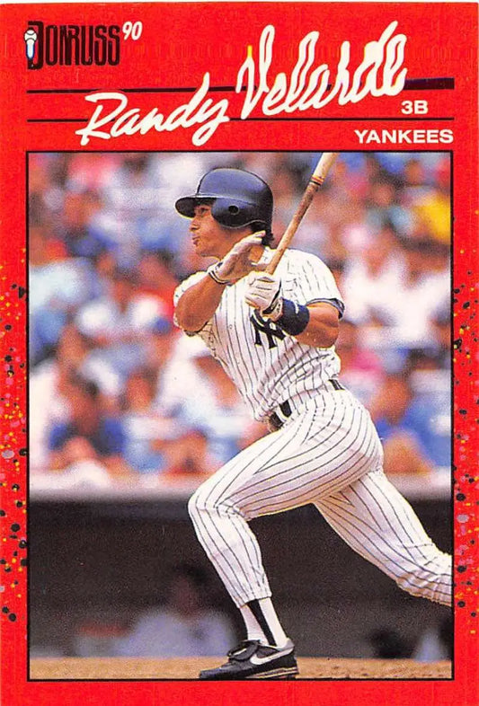 Red 1990 Donruss baseball card featuring Yankees player at bat, ideal for trading cards collection