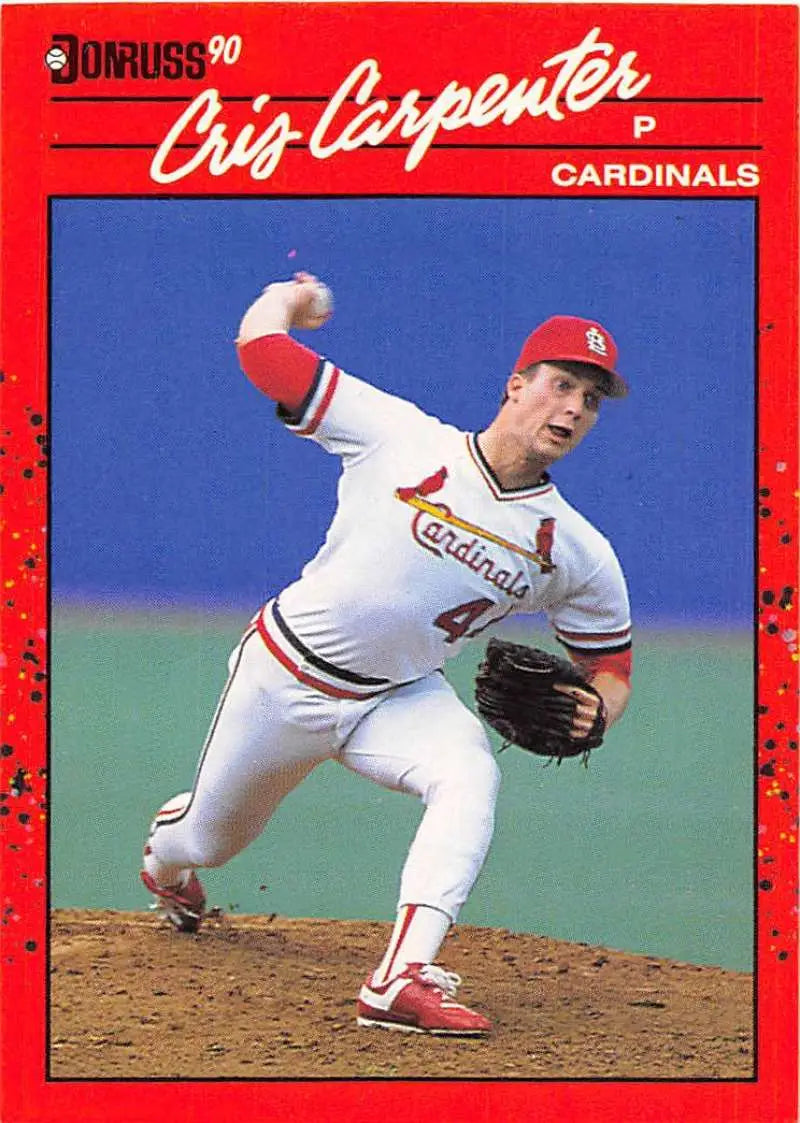 Red-bordered 1990 Donruss baseball card of a Cardinals pitcher mid-delivery