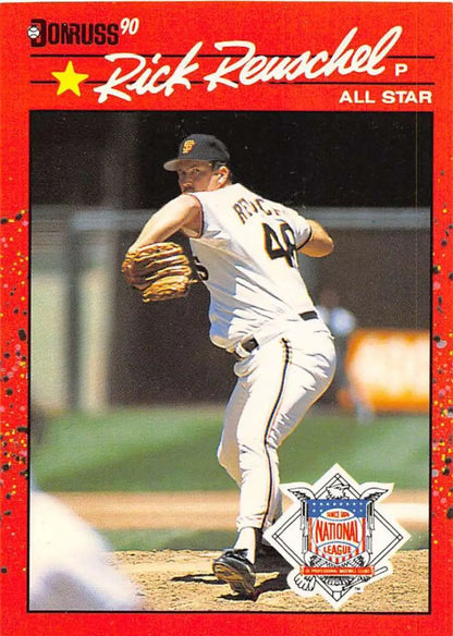 1990 Donruss baseball card of Rick Reuschel, San Francisco Giants pitcher mid-delivery