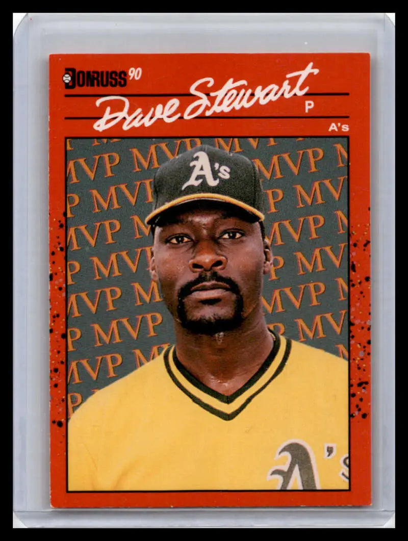 1990 Donruss Baseball Card of Dave Stewart in Oakland Athletics yellow jersey and green cap