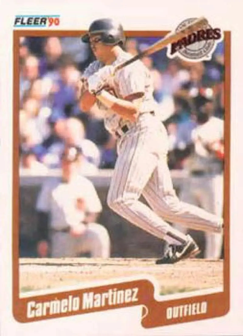 San Diego Padres outfielder Carmelo Martinez at bat in pinstriped uniform baseball card