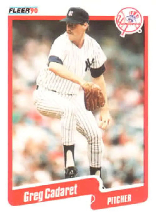 Baseball card of Greg Cadaret in New York Yankees pinstripes during windup motion