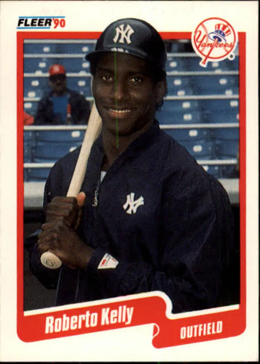 1990 Fleer Roberto Kelly baseball card featuring New York Yankees outfielder with bat