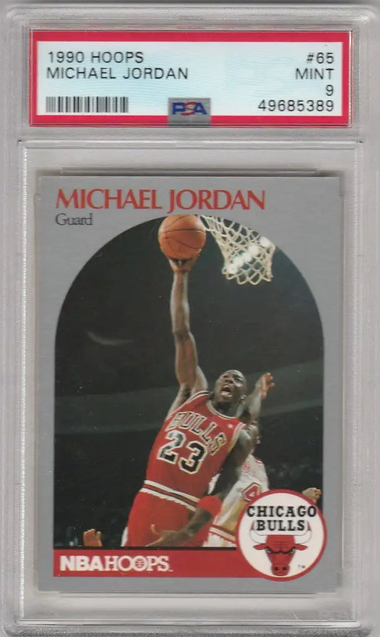 Graded 1990 Hoops Basketball #65 Michael Jordan Chicago Bulls PSA 9 card dunking image