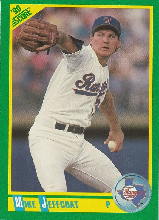 Baseball card of Mike Jeffcoat mid-delivery for Texas Rangers in white uniform