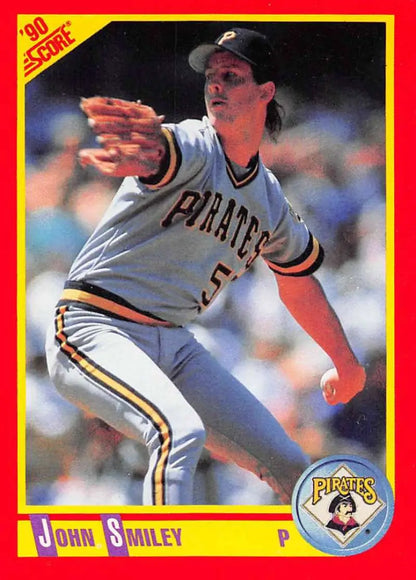 1990 Score John Smiley Pittsburgh Pirates baseball card showing pitcher mid-delivery