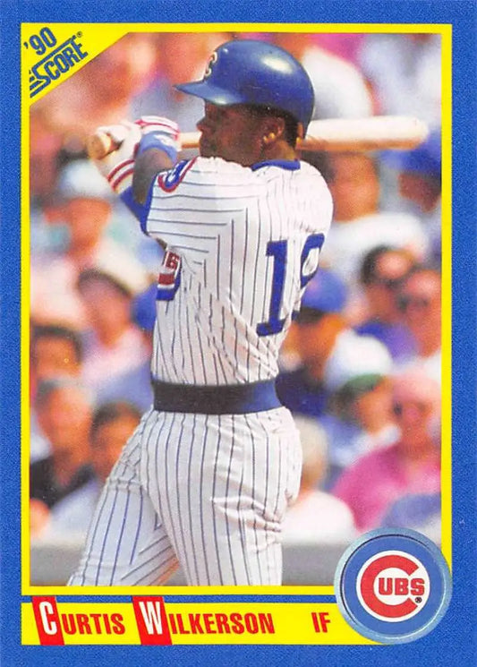 Chicago Cubs baseball card of Curtis Wilkerson in pinstripe uniform at bat