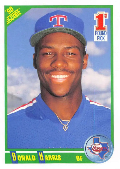 1990 Score #661 Donald Harris Texas Rangers Baseball Card with a smiling player