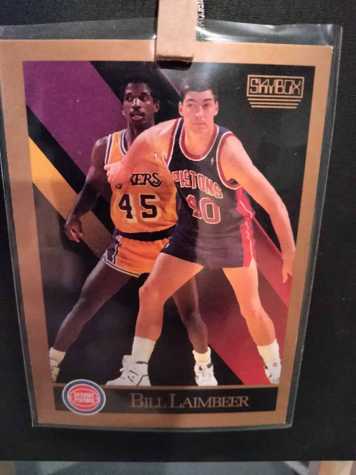 Bill Laimbeer basketball card from 1990 SkyBox featuring Detroit Pistons player