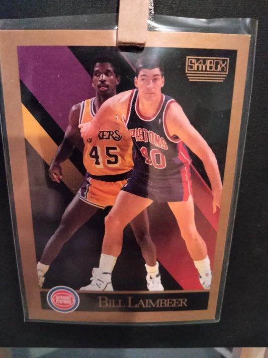 Bill Laimbeer basketball card from 1990 SkyBox featuring Detroit Pistons player