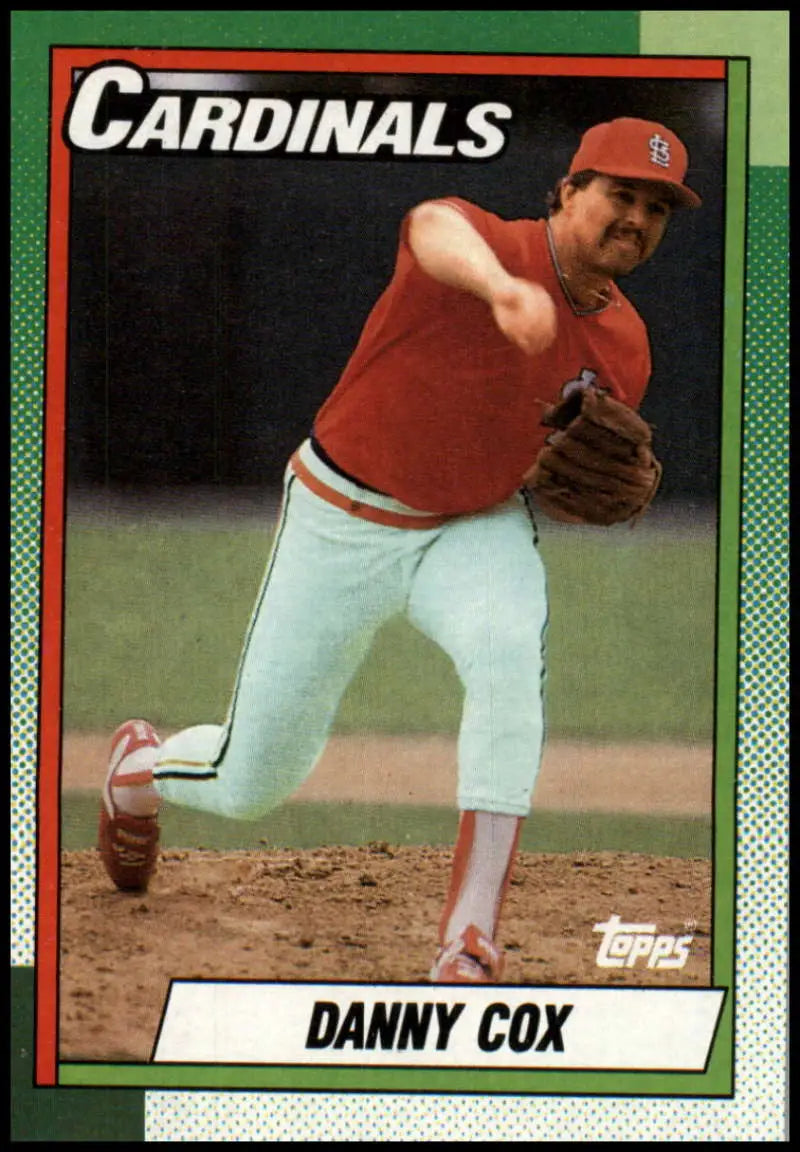 Danny Cox in mid-throw on a 1990 Topps St. Louis Cardinals baseball card