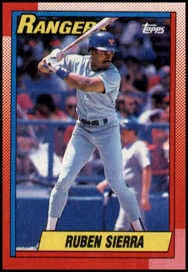 1990 Topps Ruben Sierra baseball card of Texas Rangers batter at the plate