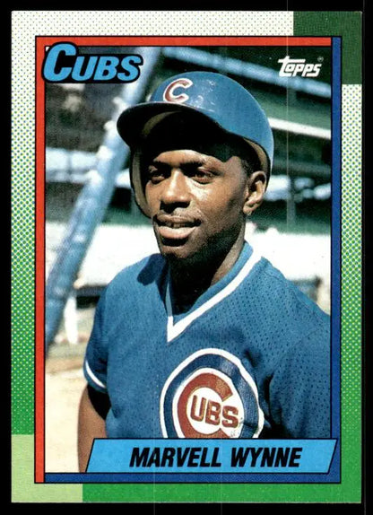 A 1990 Topps baseball card featuring a Chicago Cubs player in a blue uniform and cap.